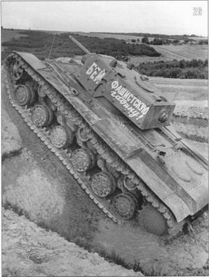 Screened KV-1 heavy tank (it bears inscription "Kill the fascist toad!") 
