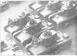 On the photo one can see T-26 first edition guns are at the parade. 1933