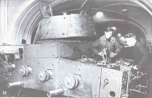 The T-26 tank is being screened at one of the Leningrad's facilities. Autumn 1941.