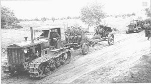 STZ-3 tractors are towing 122mm M-30 howitzers M1938. South-Western Front. June 1941.