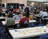 The boardgame room at Origins provides tables and loans games to players.