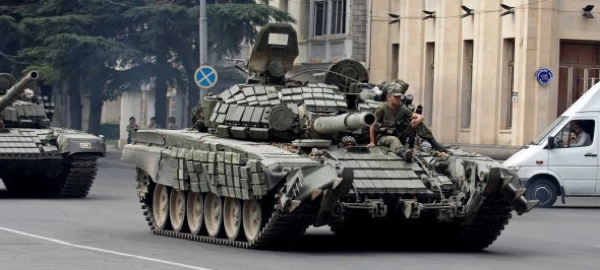 Georgian tanks race through the streets August 11, 2008 in Gori, Georgia. Russian forces have advanced into Georgia through the separatist enclave of Abkhazia in an apparent broadening of the conflict past the disputed region of South Ossetia. Photo by Cliff Volpe/Getty Images.