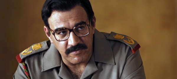 Igal Naor as Saddam Hussein in House of Saddam