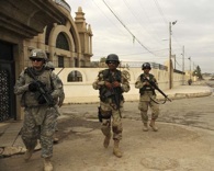 October 30, 2008. Army 1st Lt. John Nimmons, 3rd Armored Cavalry Regiment, leads a patrol with Iraqi soldiers in Al Muhandiseen, Iraq. Photo by Army Staff Sgt. JoAnn Makinano.
