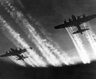  Vapor trails emerge from two Boeing B-17 Flying Fortress bombers. (National Archives)