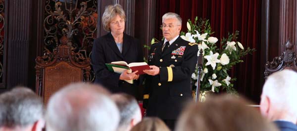 Harvard University President Drew Gilpin Faust (left) and Army Chief of Staff Gen. George Casey sing a hymn at the Harvard memorial ceremony inside Memorial Church in Harvard Yard. (Casper W. Weinberger Jr.)
