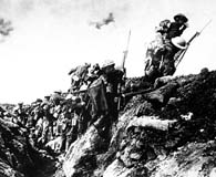 Canadian troops go ‘over the top’ during a training exercise on World War I’s Western Front. (National Archives)