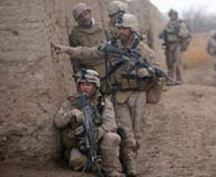February 22, 2010. Marines of the 3rd Battalion, 6th Marine Regiment, investigate a possible improvised explosive device while on patrol in Marjah, Helmand province, Afghanistan. (Lance Cpl. Tommy Bellegarde)