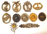 A collection of German World War II badges - all likely fakes and  sold as original. These were acquired by the author as part of a  larger collection, and the previous owner likely paid good money  believing these to be real. The quality of fakes keeps getting better  and better unfortunately.