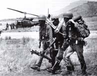 March 15, 1975. South Vietnamese troops prepare to board helicopters at Phouc An that will carry them to battle at Ban Me Thout in the central highlands. (National Archives)