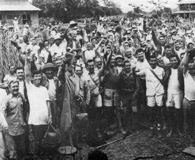 Jubliant prisoners liberated from Cabanatuan prison camp. US Army photo.