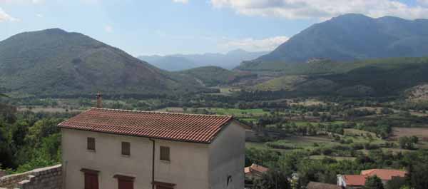 The mountains south of San Pietro were the scenes of bloody  battles fought in 1943. In the distance is the Mignano Gap and on the right is Monte Lungo. (Carlo D’Este)