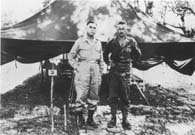 Col. Russell Vockmann (right) with Filipino guerilla officer, Basilio Valdes, Cagayan Valley, July 1945. (U.S. Army