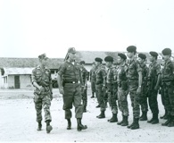 Blackburn inspects the troops at a SOG Camp near the Laotian border, 1966. Click to enlarge.