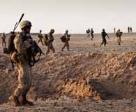October 14, 2010. Marines of 3rd Battalion, 3rd Marine Regiment, and Afghan National Army soldiers conduct anti-insurgent operations in Helmand Province, Afghanistan.