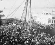 A crowd cheers as the Red Star Line ship Finland, which was transporting the U.S. Olympic team to the 1912 games in Stockholm, Sweden, departs. (Library of Congress)