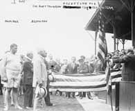 Robert Thompson, president of the American Olympic Association, accepts the American Flag for the U.S. team during the Olympic Games, in Stockholm, Sweden, in 1912. (Library of Congress)