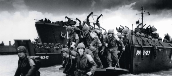 American troops wading ashore during a training exercise. D-Day, especially at Omaha Beach, would not be so calm.