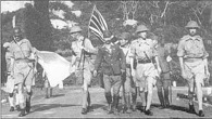 British officers walk to the surrender ceremonies at Singapore.