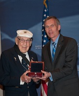 Doolittle Raider retired Lt. Col. Richard Cole presents the Raidersâ€™ Congressional Gold Medal to retired Lt. Gen. John Hudson, the director of the National Museum of the U.S. Air Force, during a ceremony at Wright-Patterson Air Force Base, Ohio, April 18, 2015. The medal is on display in the museumâ€™s World War II Gallery in the Doolittle Raid exhibit. Click to enlarge. (U.S. Air Force photo/Niki Jahns)