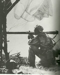Shortly after landing on Corregidor Islandâ€™s "Topside" a 503d paratrooper prepares to attack Japanese bunkers with a bazooka.