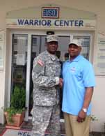 Troy Vincent (right), former All-Pro player and now NFL Executive Vice President of Football Operations, visits wounded warriors in Germany. 