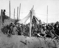 Turkish prisoners behind their own barbed wire at Seddul Bahr. Ca. 1915 Dardanelles Campaign. Click to enlarge. (National Archives)