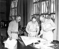 Eisenhower briefs Lt. Gen Lesley J. McNair as Maj. Gen. H. A. Dargue looks on during the Louisiana Maneuvers, Sept. 14, 1941. National Archives.