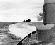 Bismarck firing at Hood, photographed from the Prinz Eugen. U.S. Naval Historical Center.
