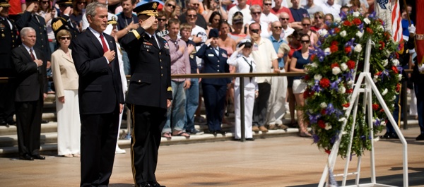 President George W. Bush lays a wreath at the Tomb of the Unknown Soldier, Arlington National Cemetery, on Memorial Day 2008 in this Department of Defense photograph by Petty Officer 1st Class Chad J. McNeeley. In Ohio, an 84-year-old veteran annually honors war dead in his own way, as Carlo D'Este explains in this story.