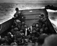 Soldiers of the 1st Infantry Division head toward Omaha Beach during the Allied invasion of Europe. National Archives.