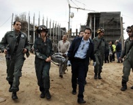 December 29, 2008. Israeli soldiers of the Home Front Command's Search and Rescue Unit evacuate those injured by a Grad missile attack on Ashkelon, Israel. Courtesy IDF.