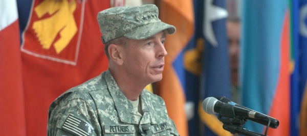 Gen. David Petraeus addresses hundreds of spectators at Camp Victory after handing over control of Multi-National Force-Iraq to Gen. Ray Odierno on Sept. 16. Photo by Army Sgt. Brent Powell.
