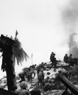 Marines assualt Japanese fortifications on Tarawa.