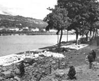 Patton's men of the 3d Battalion, 317th Infantry Regiment  prepare for an attack across the Moselle River after finally getting their offensive going again. (U.S. Army Center of Military History)