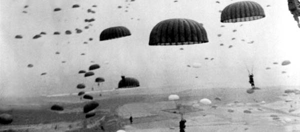 September 17, 1944. Parachutes of the 1st Allied Airborne Army open overhead as waves of paratroopers land in Holland during Operation Market Garden.