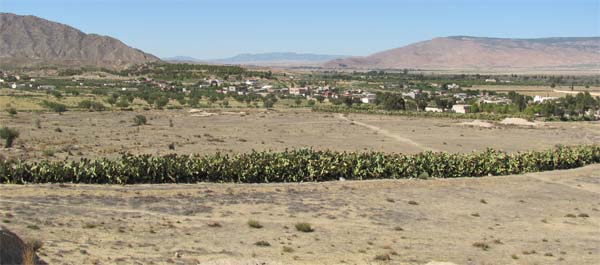 View of Kasserine Pass in 2010. On the left is Djebel Chambi, Tunisia&rsquo;s largest mountain at 5,064 feet. On the right is Djebel Semmama, 4,447 feet. In 1943 the pass was considerably narrower, barely 800 yards across. (Shirley D&rsquo;Este)