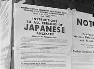 1942. An Exclusion Order is posted at First and Front Streets in San Francisco, Calif., to direct Japanese Americans living in the first San Francisco section to evacuate. (National Archives)