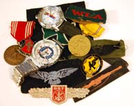 Various items that have been acquired from flea markets and garage  sales over the past 30 years. While these were acquired very cheaply,  these aren't exactly top shelf display items either.