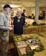 "Uncle Duke" Seifriend talks with Jim Getz at Historicon 2009.