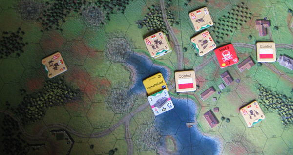 A Panzer II stuck on a bridge.