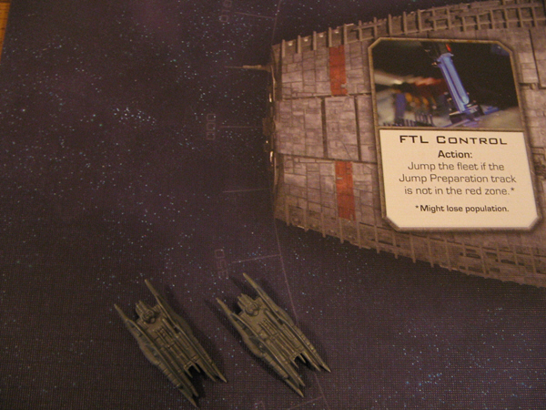 Heavy Raiders circle the Galactica.