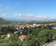 The new town of San Pietro Infine. In the distance (on the right) can be seen the outline of the Abbey of Monte Cassino. (Carlo D&rsquo;Este)