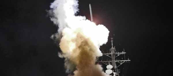 Arleigh Burke-class guided-missile destroyer USS Barry launches a Tomahawk missile in support of Operation Odyssey Dawn on March 19, 2011. (U.S. Navy Photo)