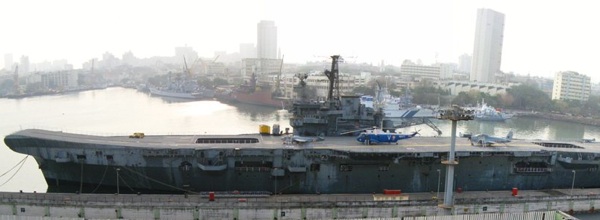 INS Vikrant, preserved as a museum ship with historic airplanes in the harbor at Mumbai. Courtesy, 'Skyring,' Wikimedia Commons.