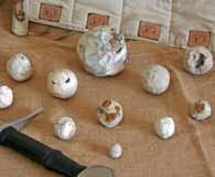 The various calibers and types of roundshot discovered at the site. (Courtesy, Glenn Foard)