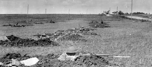 September 1918. Soldiers of the 167th Infantry Regiment man positions near St. Benoit, on the Meuse River, during the St. Mihiel offensive. (National Archives)