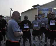 Command Sgt. Maj. Kevin Griffin, command sergeant major of Task Force Mountain Warrior, speaks with the soldier competitors of the Mountain Warrior Non-commissioned Officer and Soldier of the Quarter competition prior to the start of the event on June 21, 2012 at Forward Operating Base Fenty. CSM Griffin was killed by a suicide bomber in Kunar Province on August 7, 2012. (Spc. Elizabeth Raney)