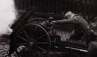 Established documentary techniques, such as archival footage, co-exist with the extended dramatizations.