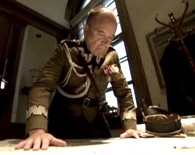 An actor portrays the frustration of Poland's Commander-in-Chief, Marshal Edward Smigly-Rydz. Click to enlarge.